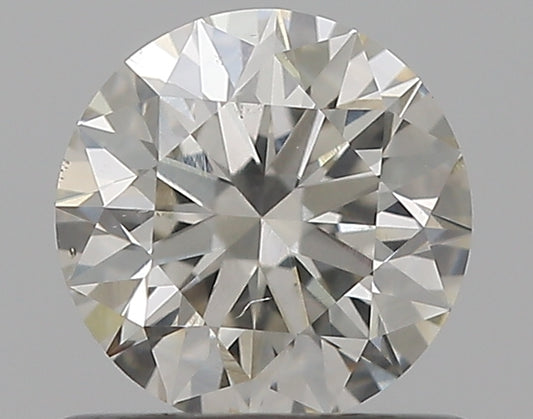 0.65CT ROUND SI1 J BRN2