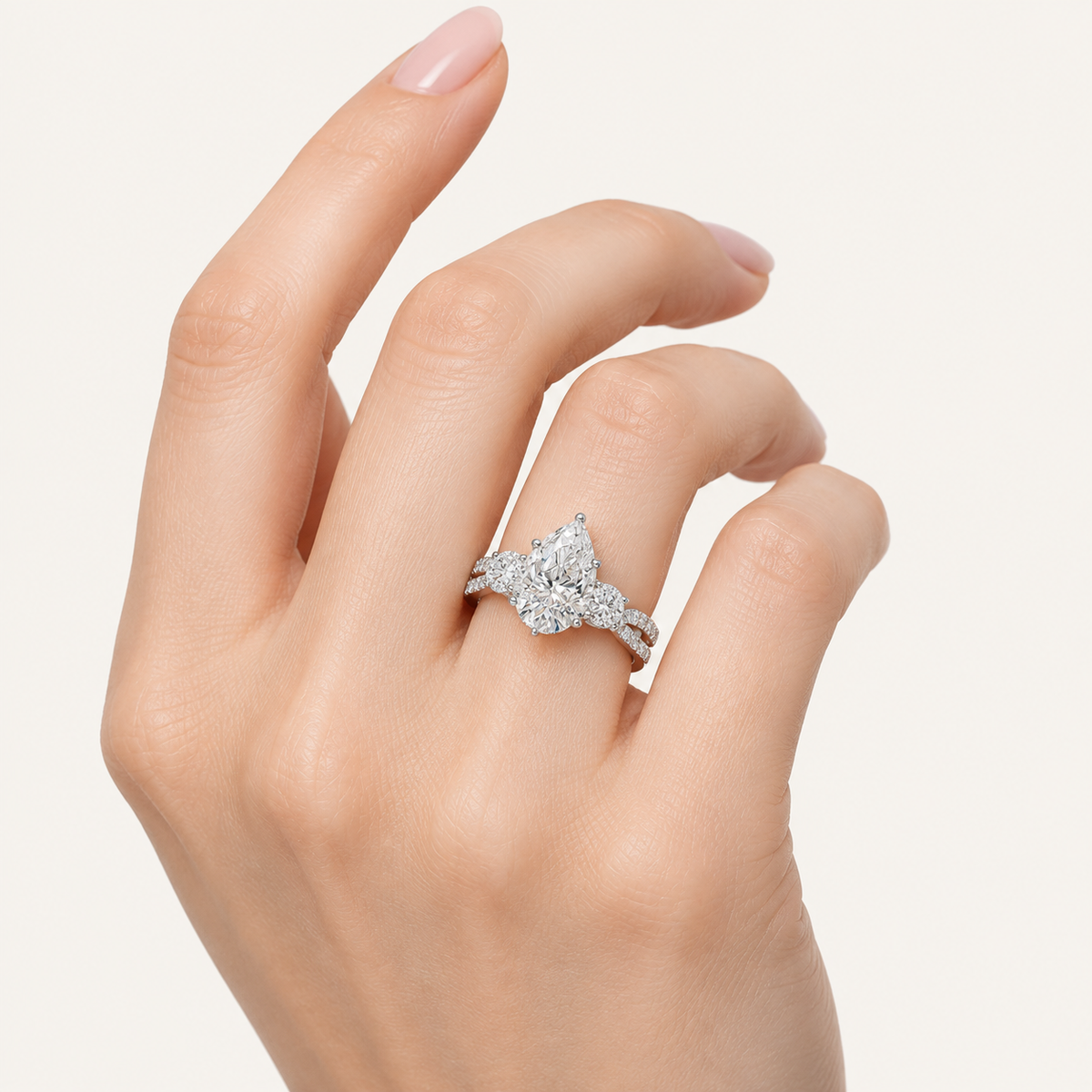 4CT Pear Cut Lab Grown Diamond Hidden Halo Three Stone Ring