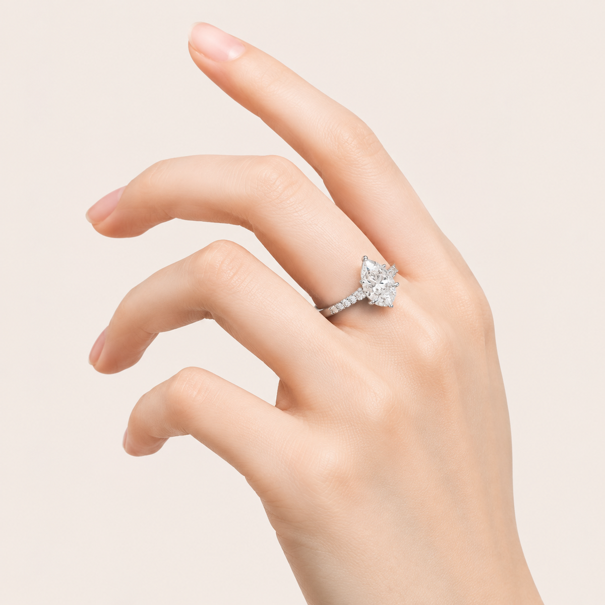 1.40CT Pear Cut Lab Grown Diamond Side Stone Ring