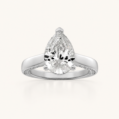1.25 CT Pear Cut Lab Grown Diamond Accented Bridge Shank Solitaire Ring