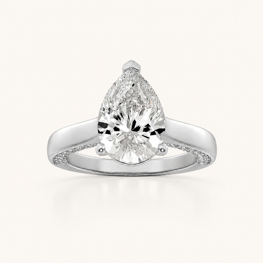1.25 CT Pear Cut Lab Grown Diamond Accented Bridge Shank Solitaire Ring