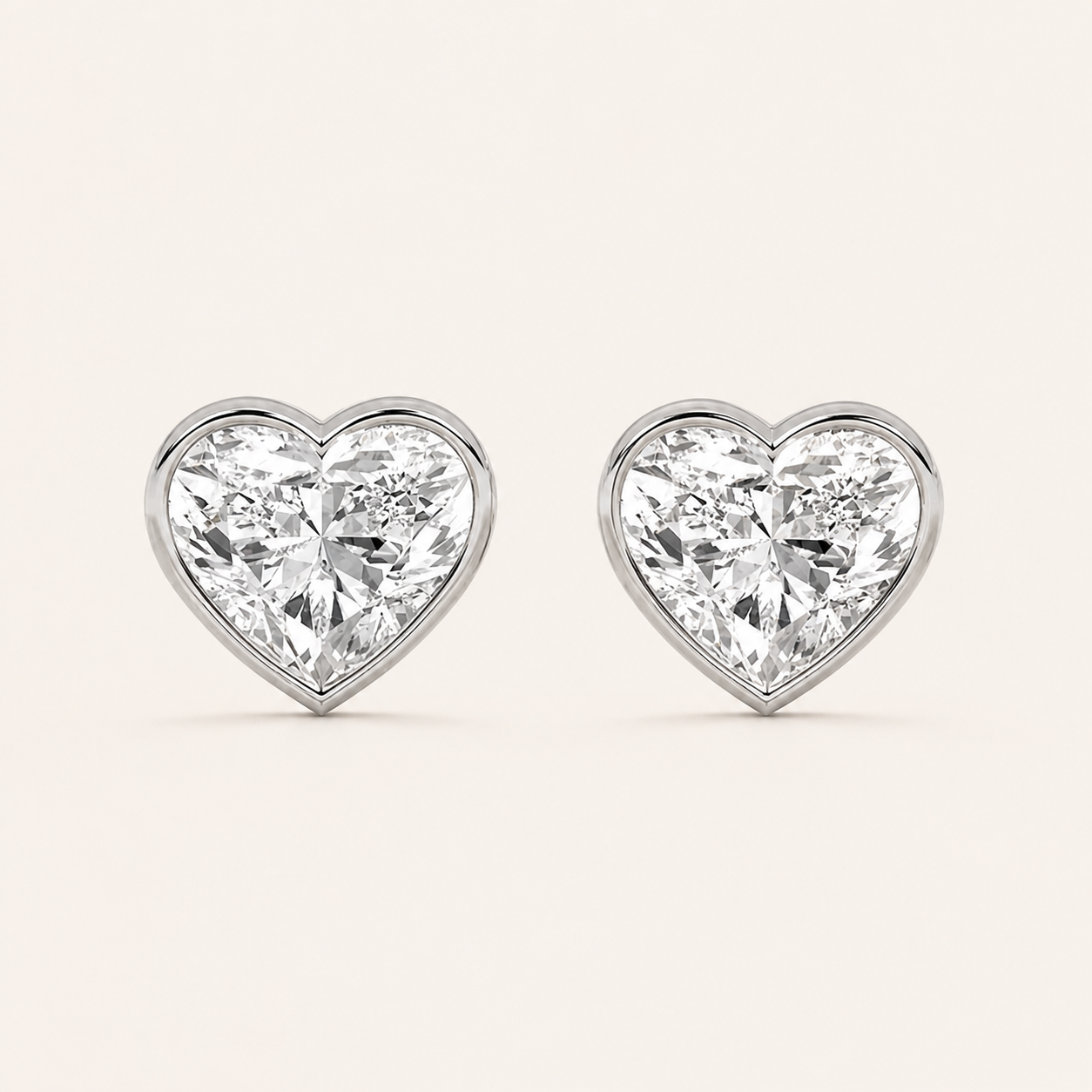 2CT Heart Cut Lab Grown Diamond Bezel Set Stud Earrings