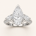 3.50 CT Pear Cut Lab Grown Diamond Three Stone Side Stone Ring