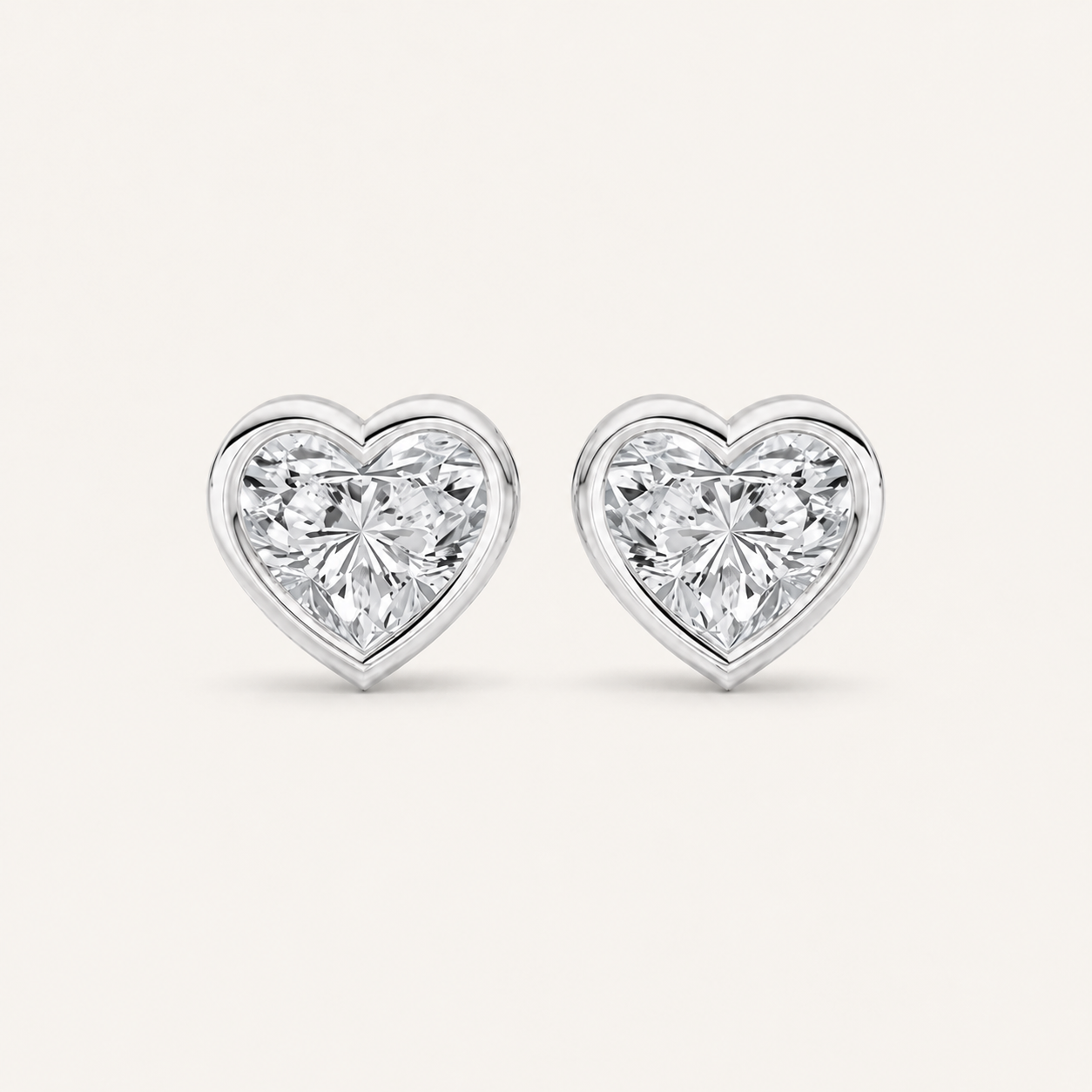1CT Heart Cut Lab Grown Diamond Bezel Set Stud Earrings