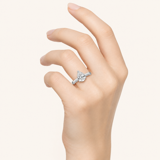 1.25 CT Pear Cut Lab Grown Diamond Accented Bridge Shank Solitaire Ring