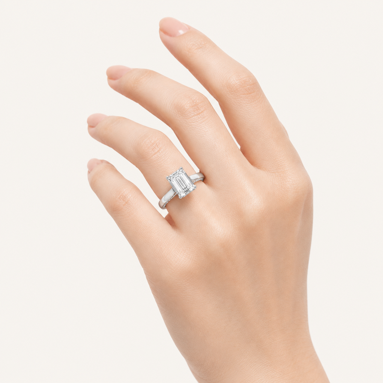 1.25 CT Emerald Cut Lab Grown Diamond Accented Bridge Shank Solitaire Ring