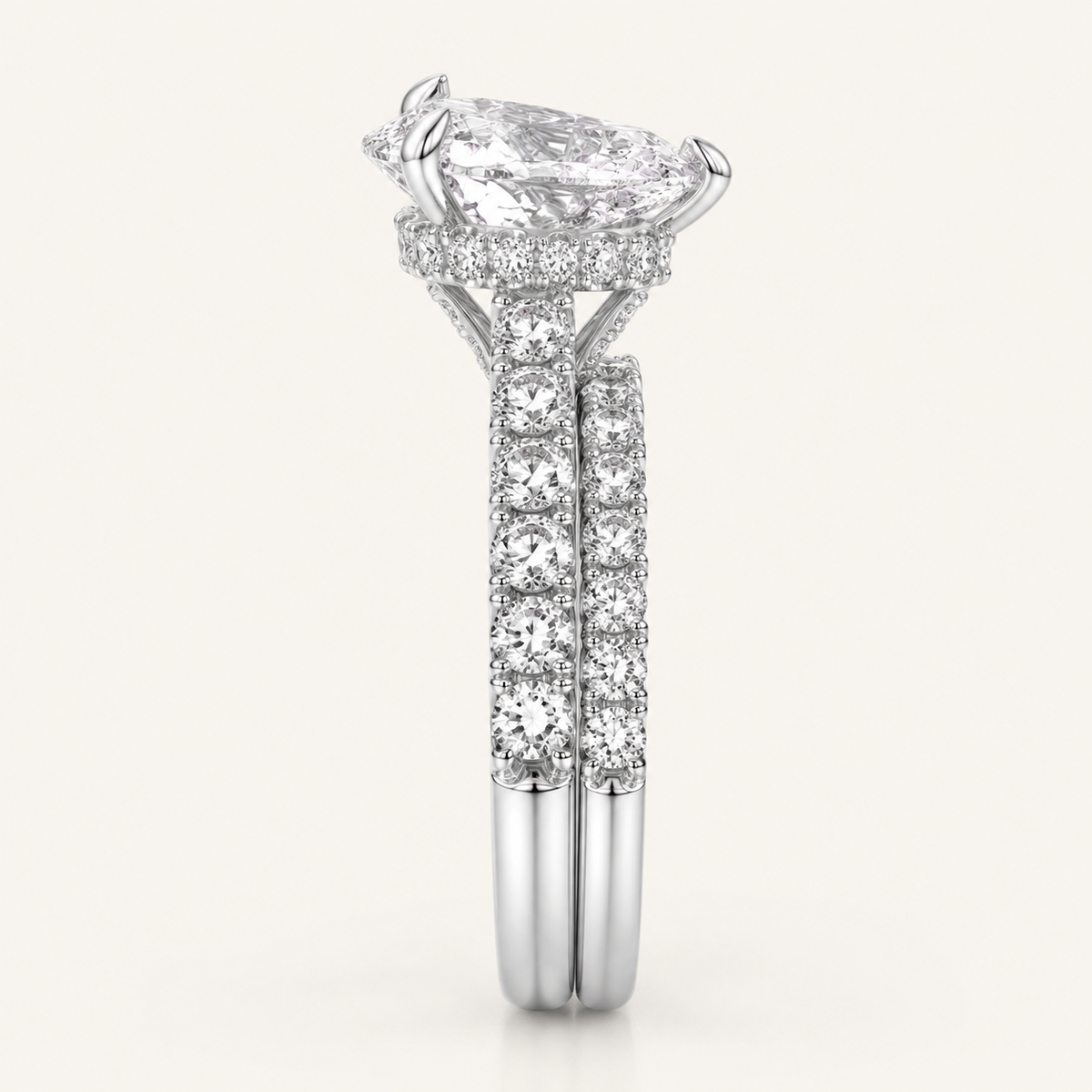 4.38CT Pear Cut Lab Grown Diamond Hidden Halo Bridal Set
