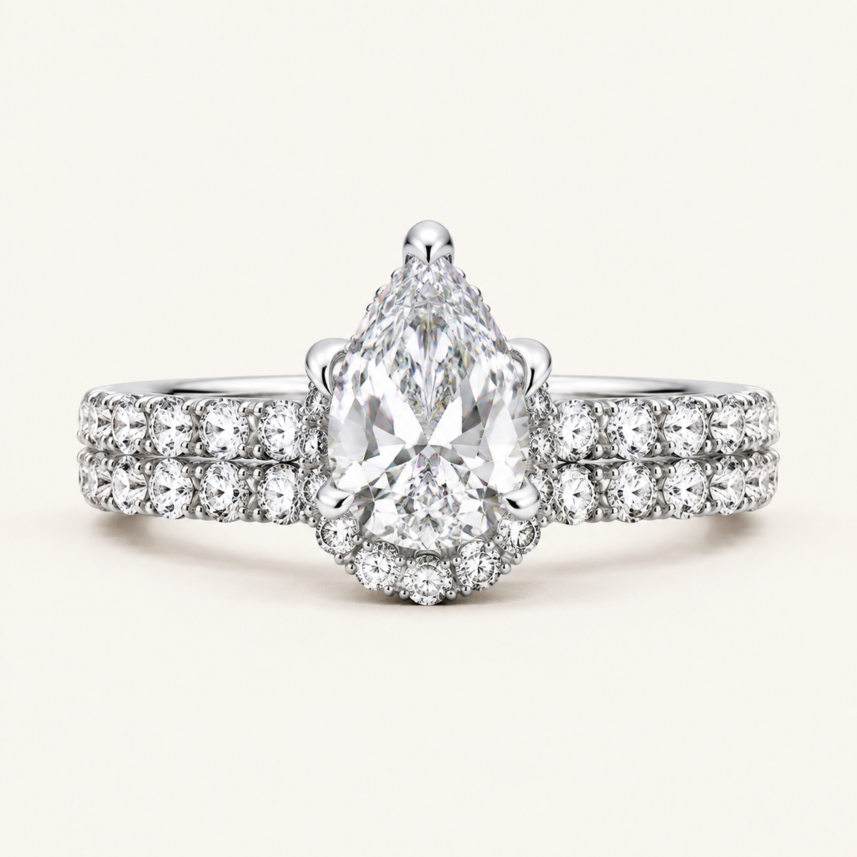 4.38CT Pear Cut Lab Grown Diamond Hidden Halo Bridal Set