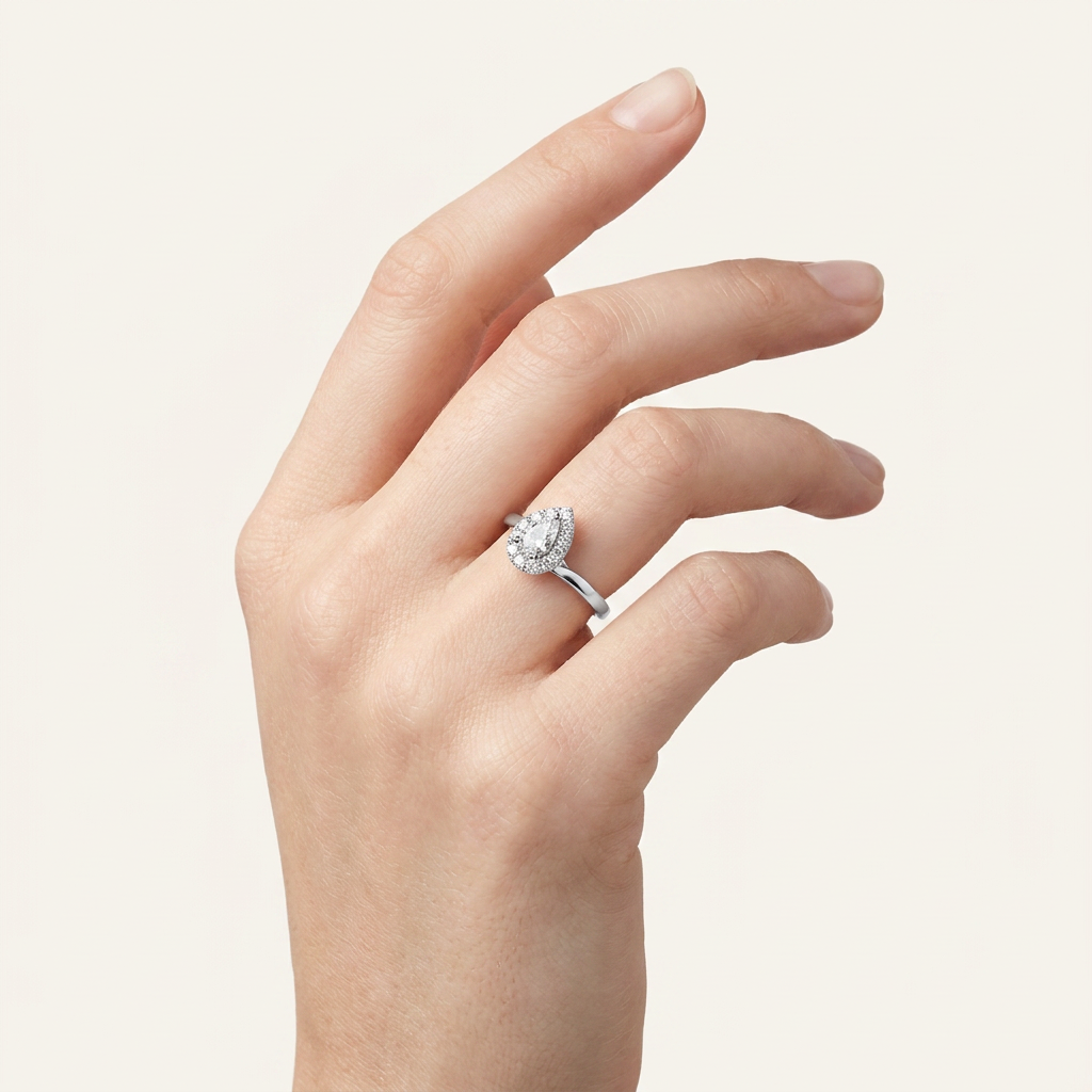 0.33CT Pear Cut Certified Lab Grown Diamond Promise Halo Ring